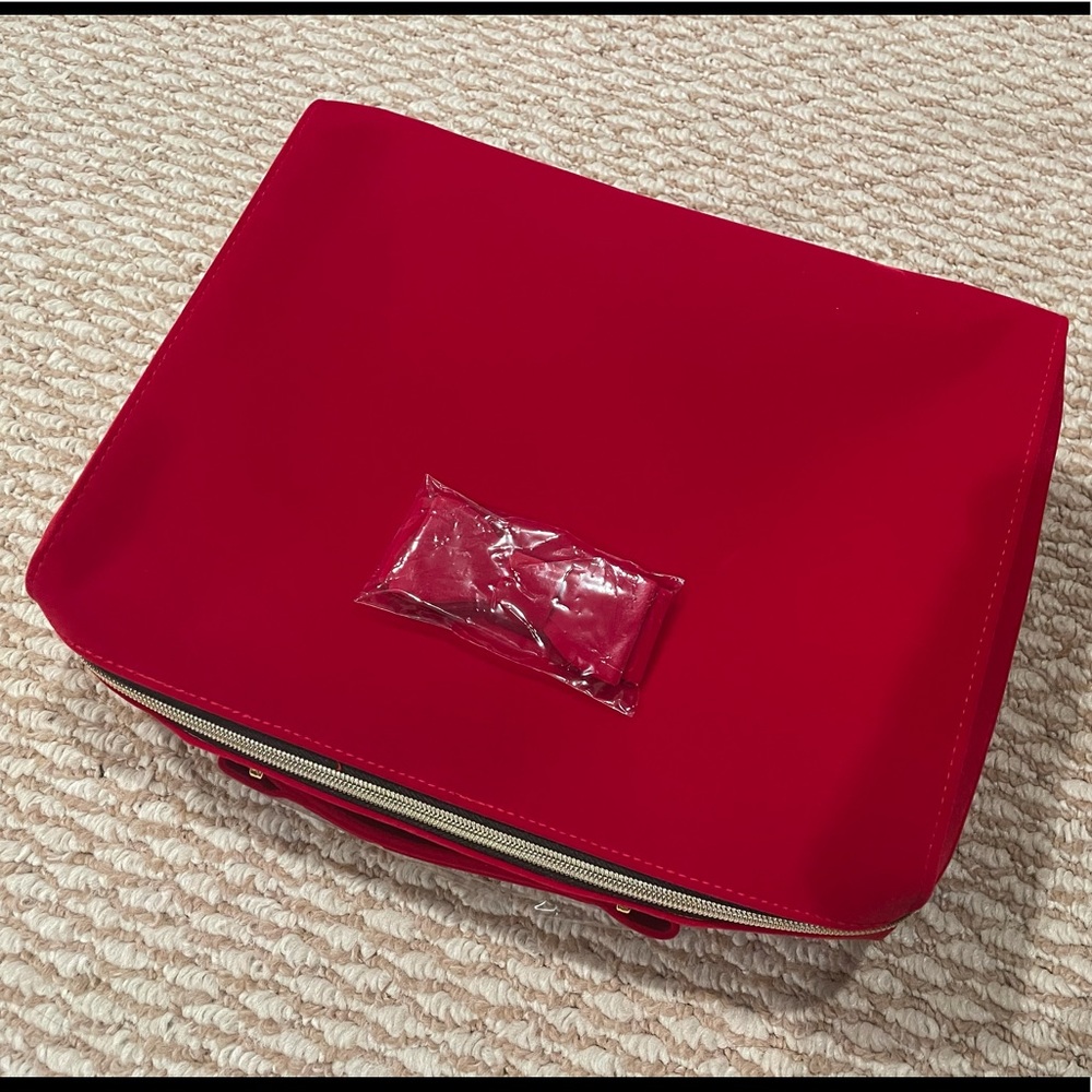 2/$15 , Estée Lauder cosmetics bag
